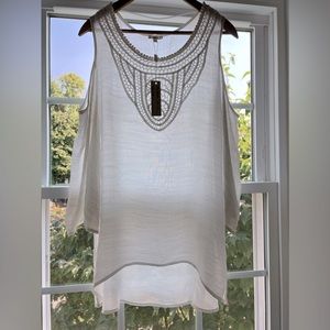 Size medium.  White, sheet, cut out shoulder, bohemian top.